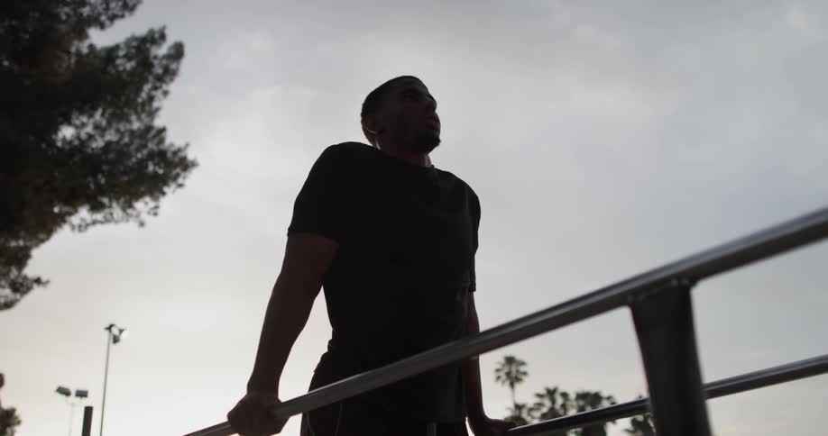 A man is working out outdoors