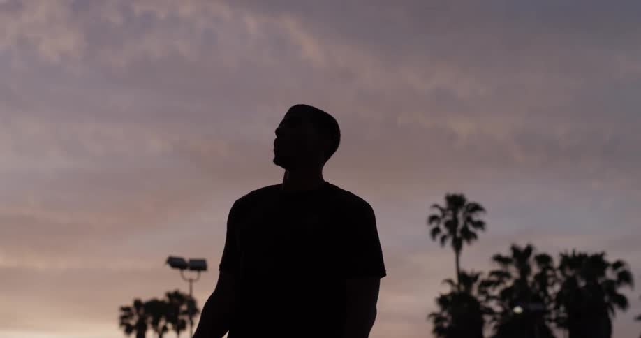 A man walking around in a park