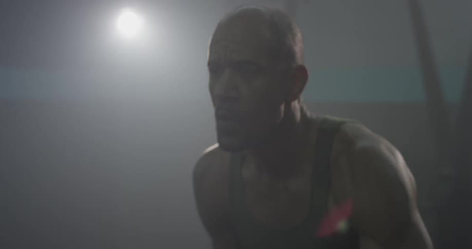 Man Working Out In Gym