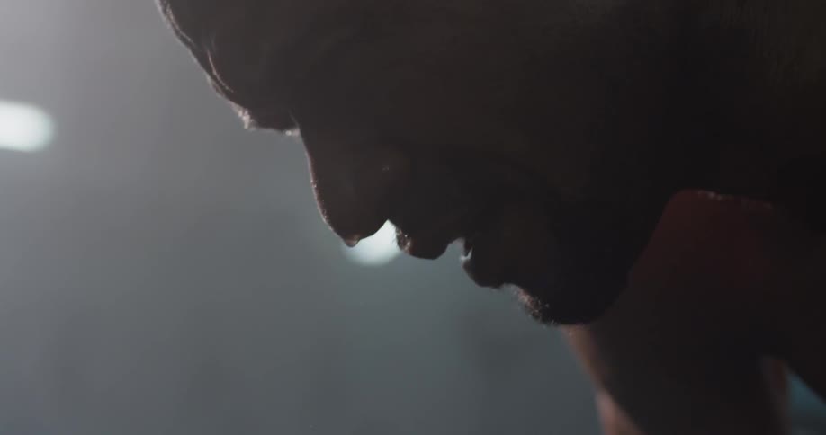 A man is sweating indoors