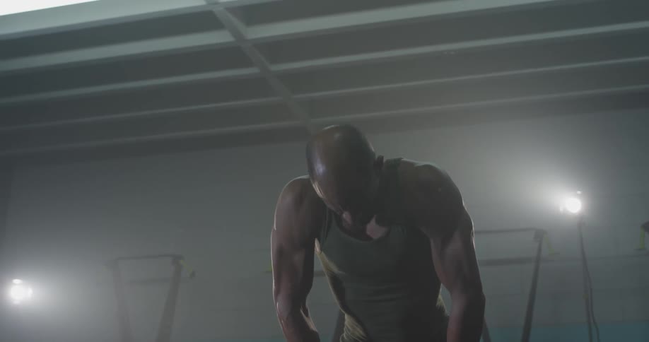 Man Working Out In Gym