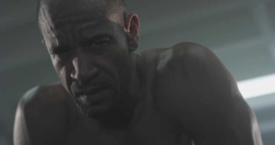 Man Working Out In Gym