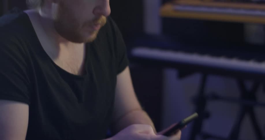A man is using his phone