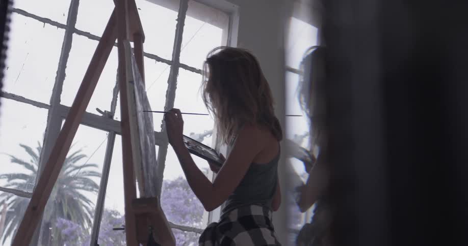 Painter In Her Studio