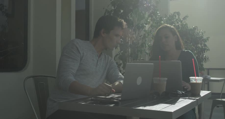 People Working On Computers Outside