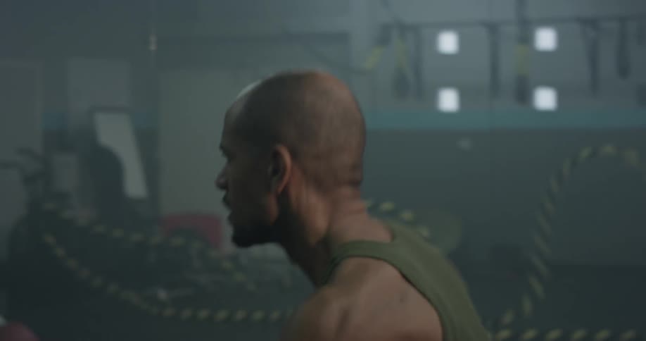 Man Working Out In Gym