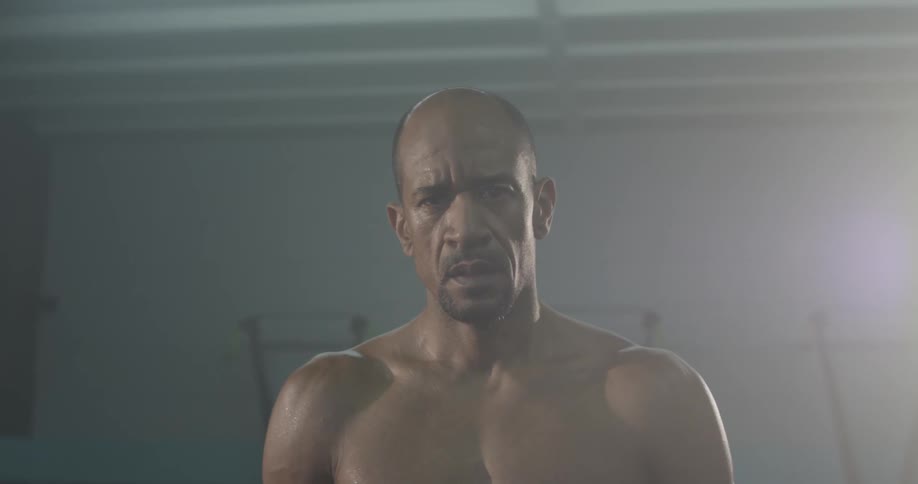 Man Working Out In Gym