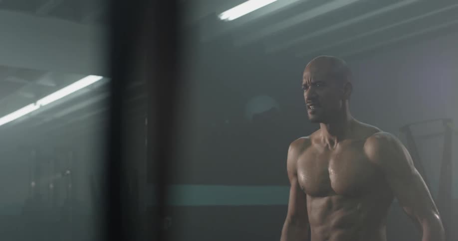 Man Working Out In Gym