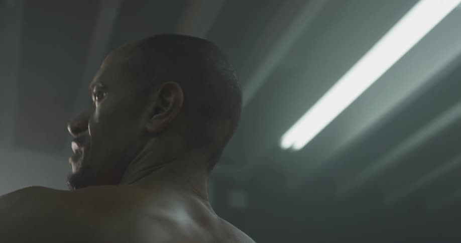 A man is stretching his arms