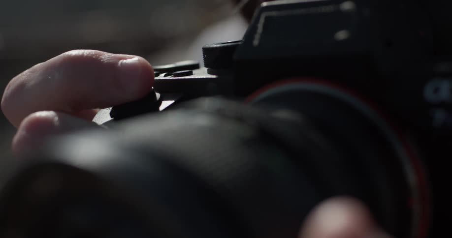 Man using a camera to take a photo