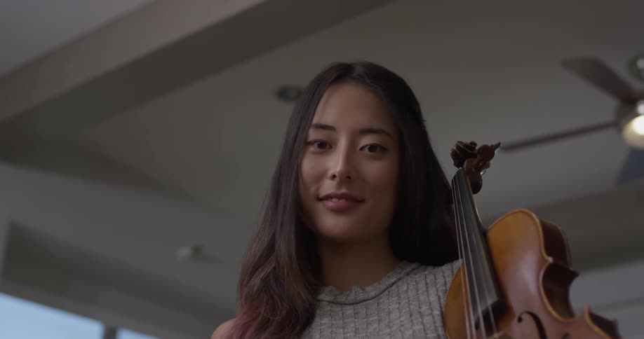 Violin Player At Home
