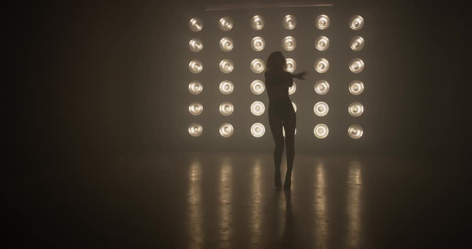 Woman Dancing In Studio