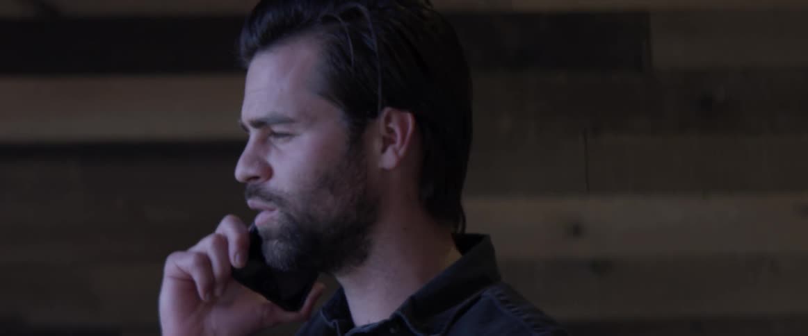 A man talking on the phone