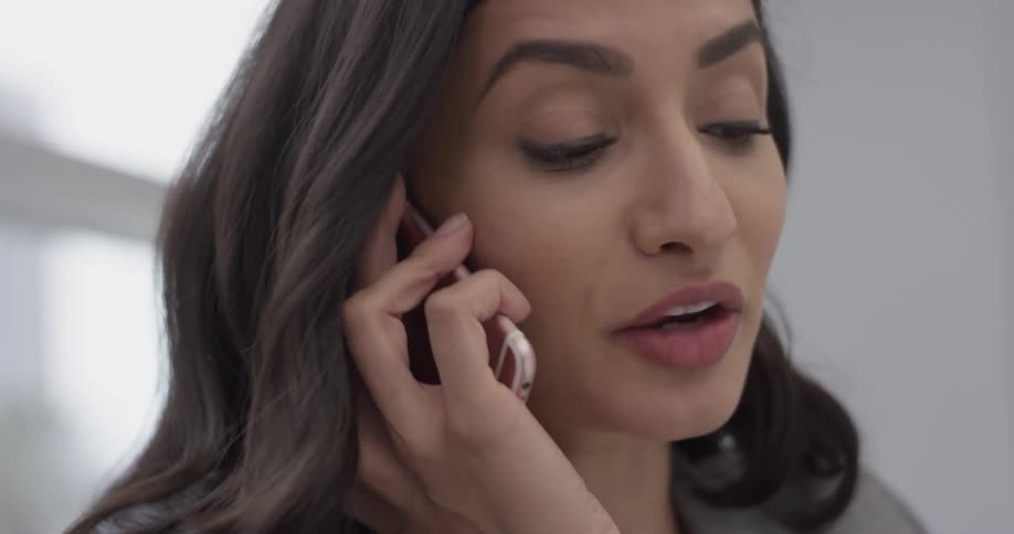 A woman talking on a cell phone