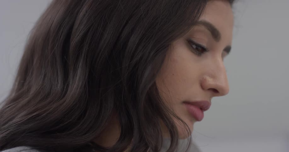 Woman looking down at something