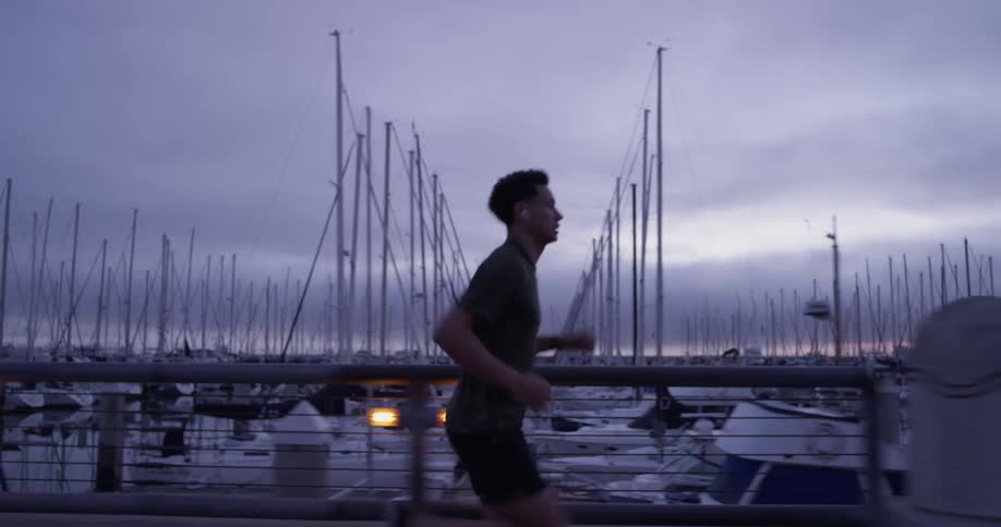 Man runs alongside marina