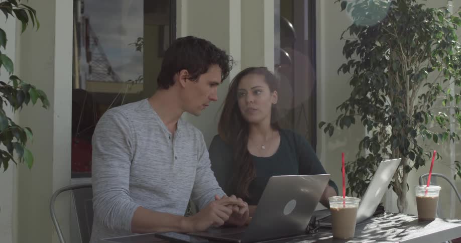 People Working On Computers Outside