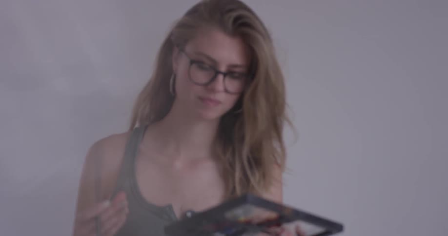 Painter In Her Studio