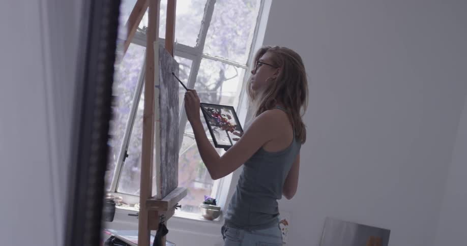 Painter In Her Studio