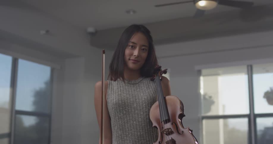 Violin Player At Home