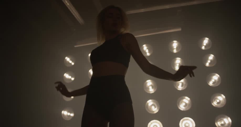 Woman Dancing In Studio