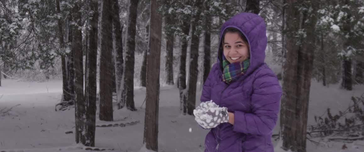 A person playing in the snow