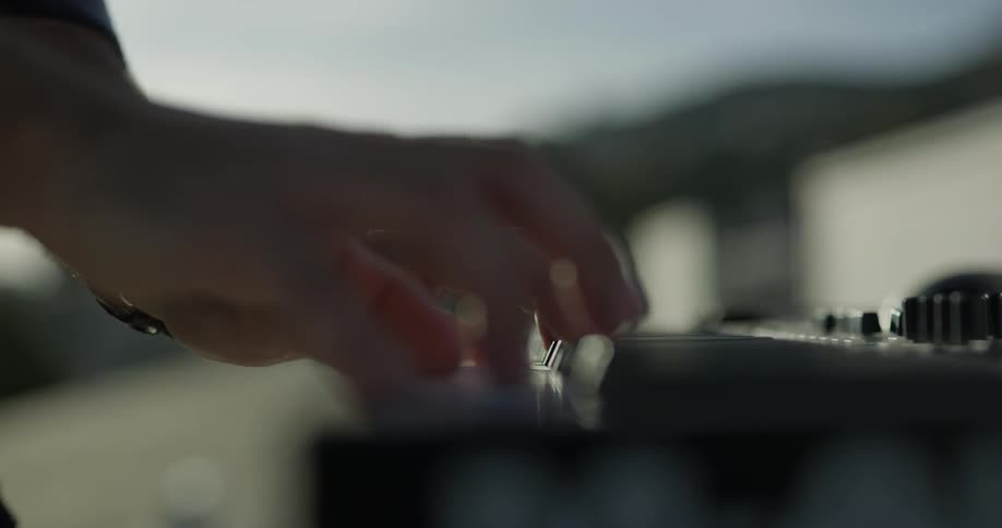 A person plays the piano while outside