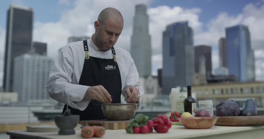 Chef Cooking In Kitchen
