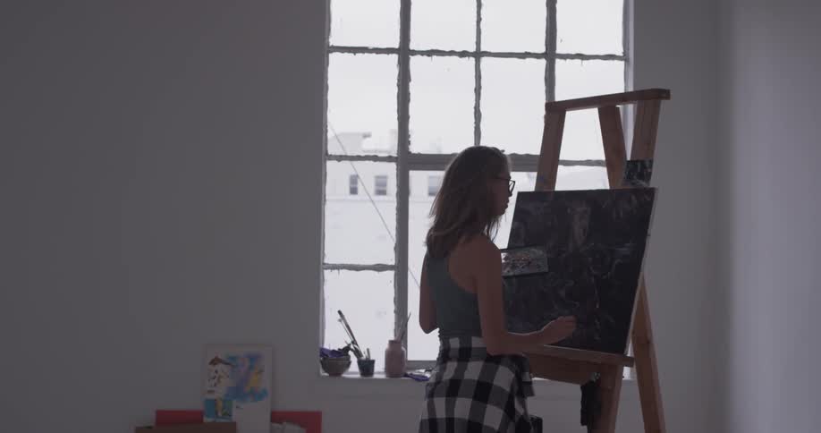 Painter In Her Studio