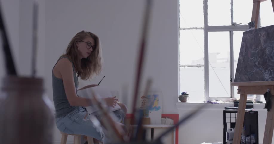 Painter In Her Studio