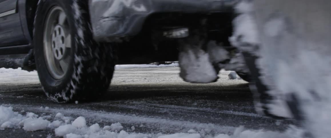 A truck is plowing snow
