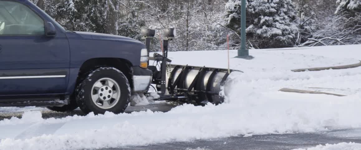 A snow plow moving snow
