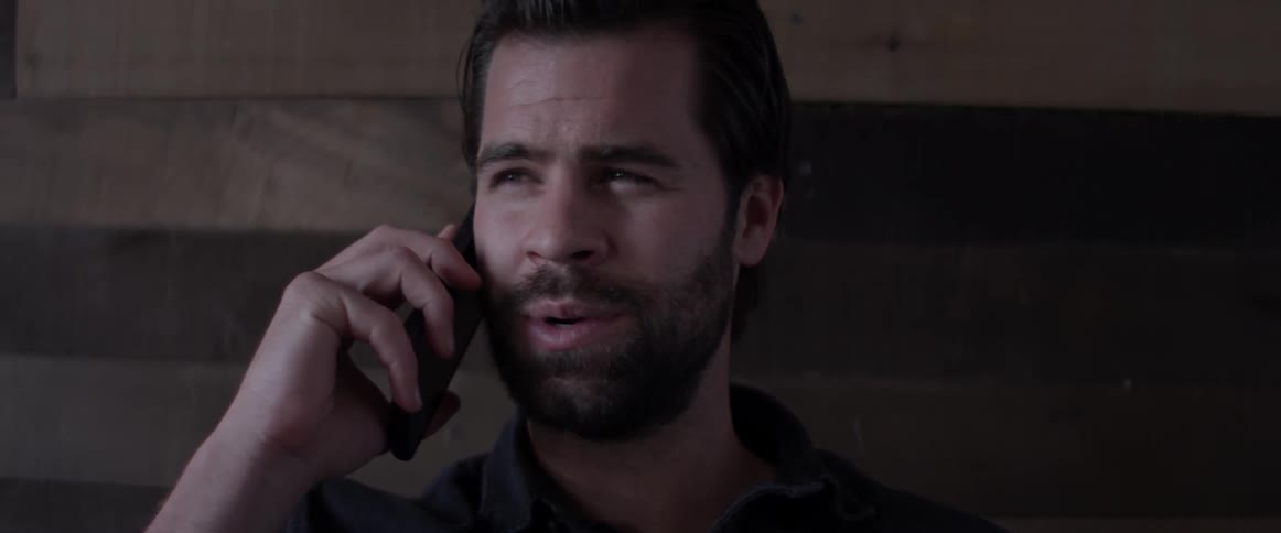 A man answering a phone call