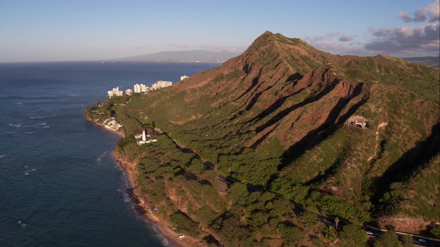 Scenic view of a town next to the ocean