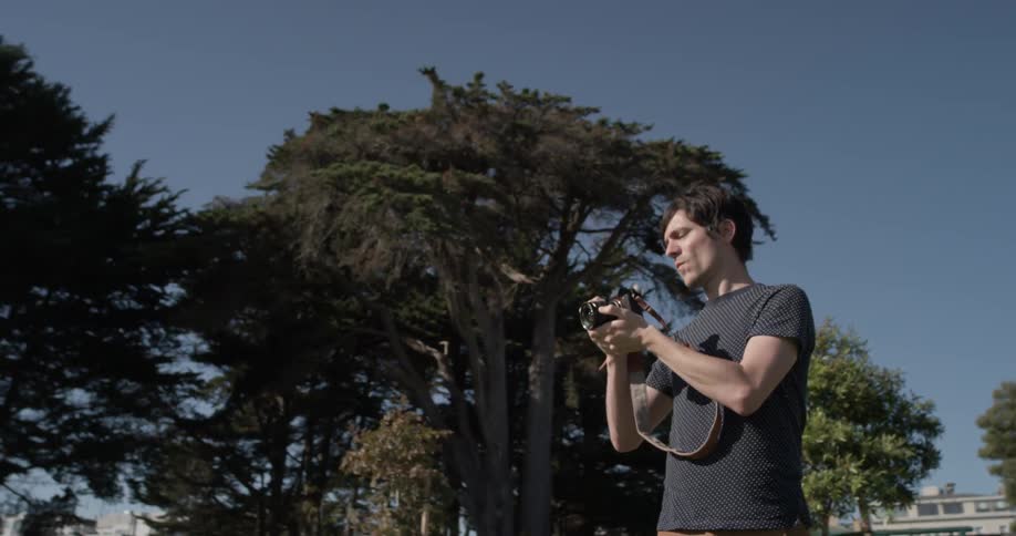 Man taking a photo with a camera