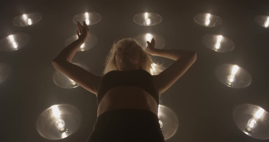 Woman Dancing In Studio