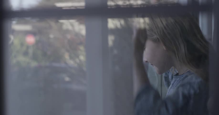 Kids Playing At A Window