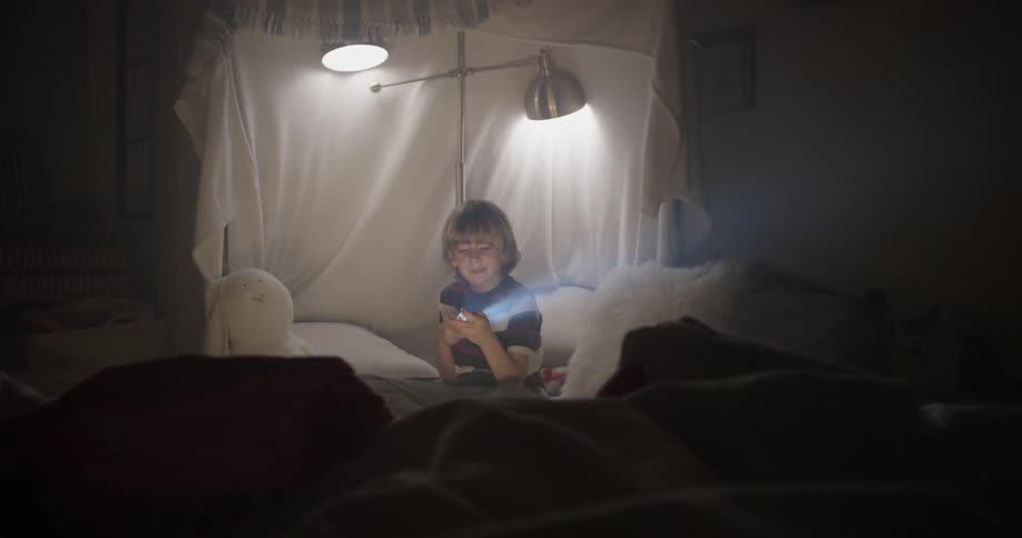 Boy In Blanket Fort