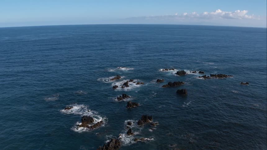 Ocean water flowing over rocks
