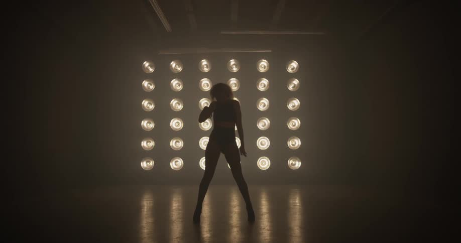 Woman Dancing In Studio