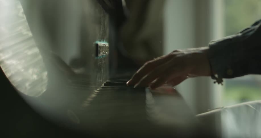 Man plays piano