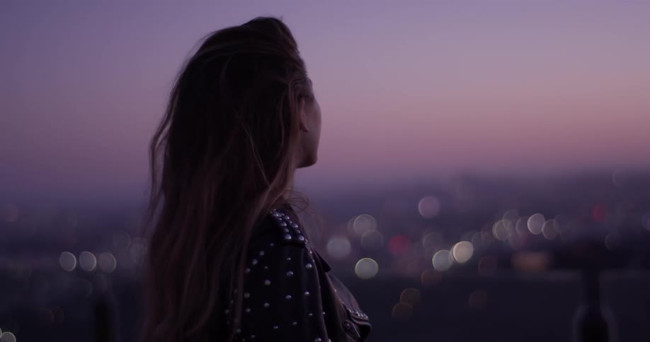 Woman Looking At Scenic View At Sunset