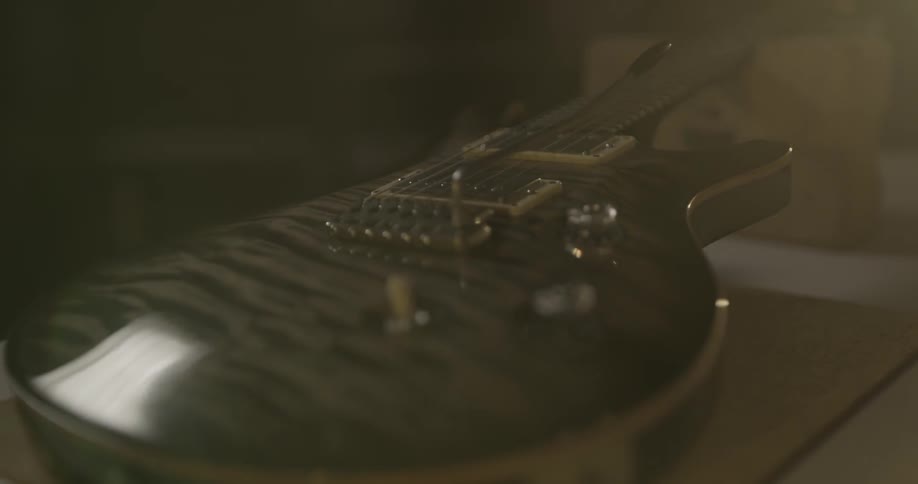 A guitar is sitting on a table