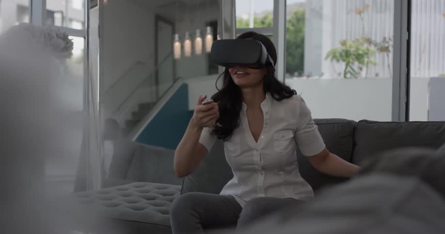 Woman In Apartment Using Electronics