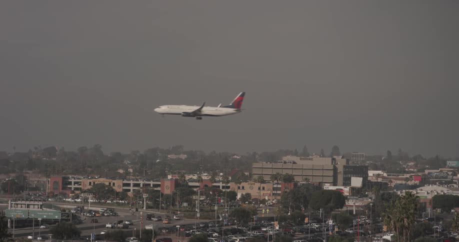 An airplane slowly moves across the frame