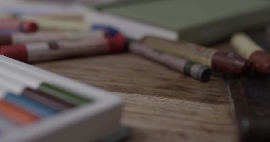 A person coloring with crayons