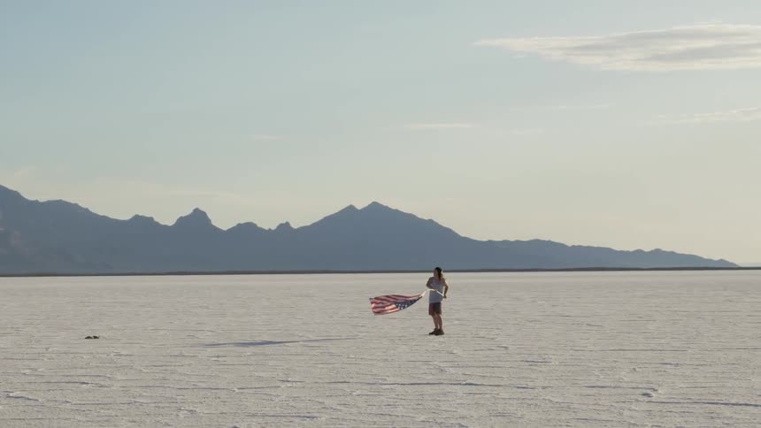 A man is waving a flag