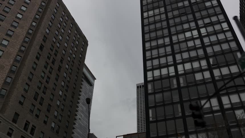 City buildings under a cloudy sky