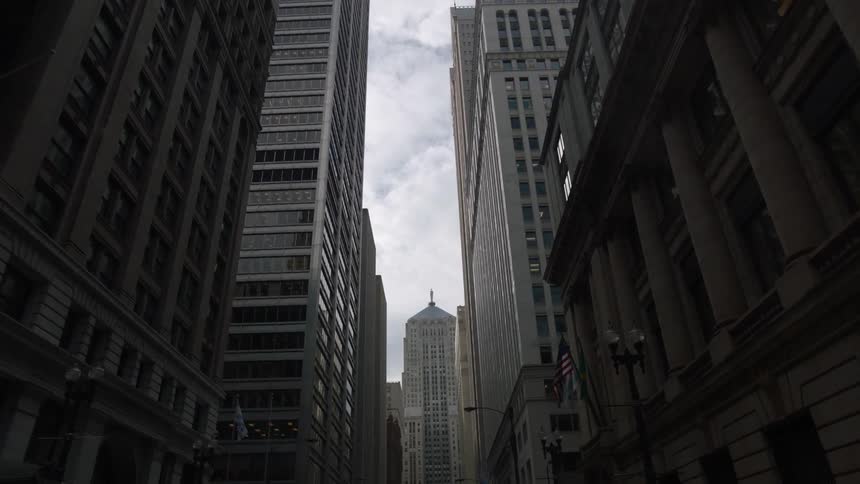 Looking up at city buildings