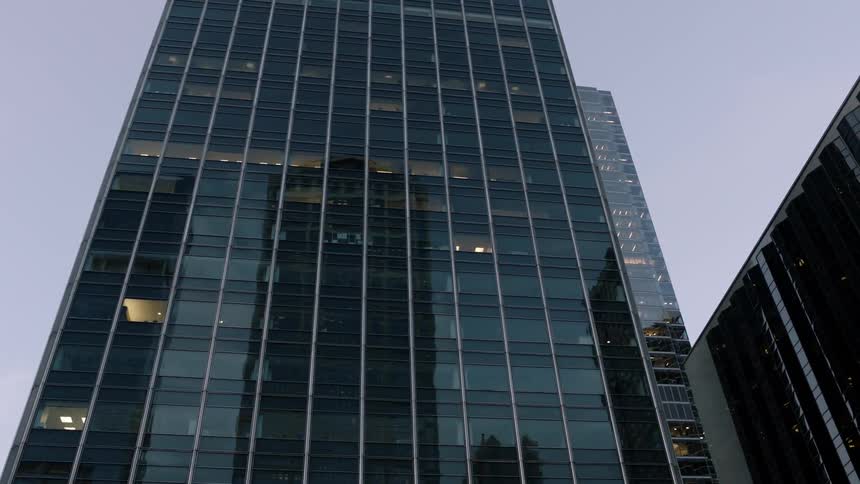 Looking up at city buildings